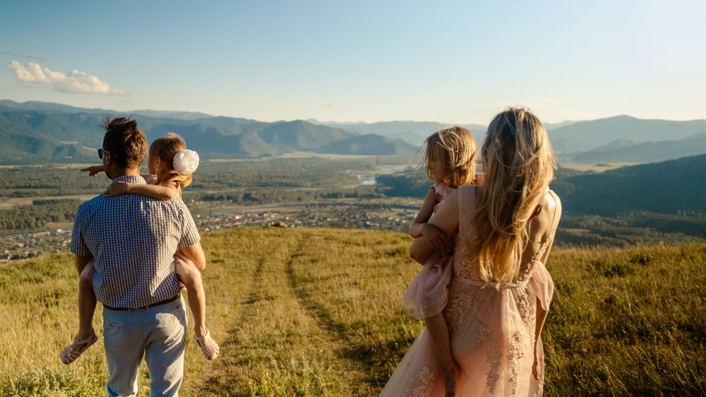 A family looking out over a valley