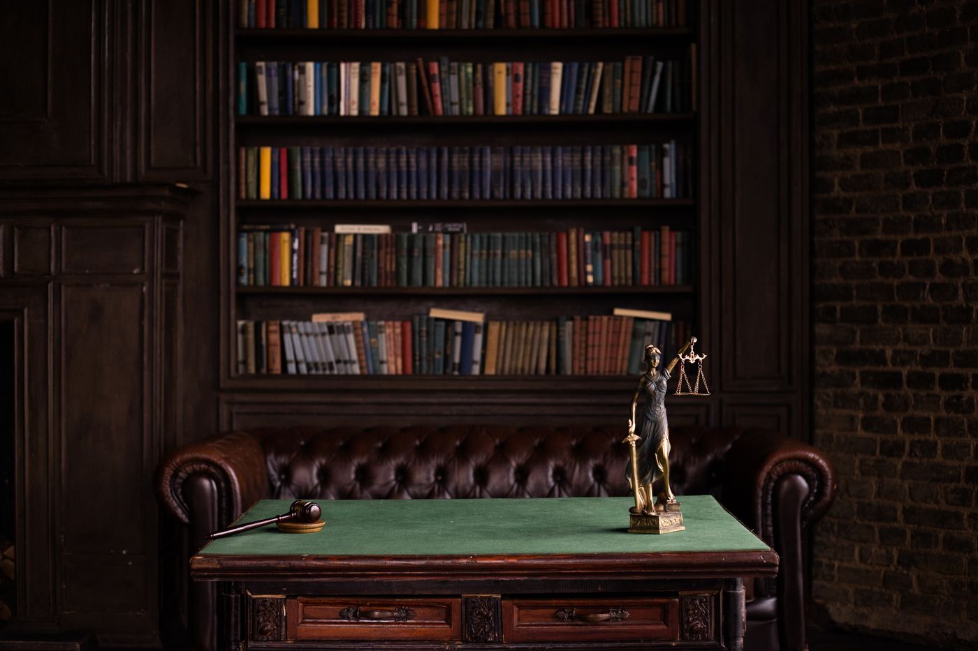 Law library with bookshelves and a leather chair